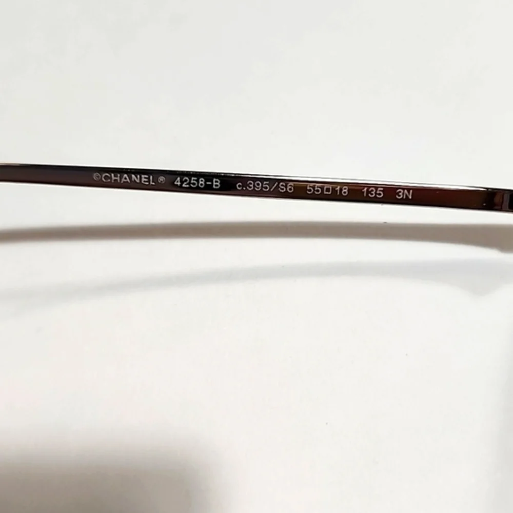 CHANEL Gold and Black Sunglasses - Picture 13 of 14